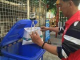 垃圾箱搬進“新房子” 小舉措帶來大改變